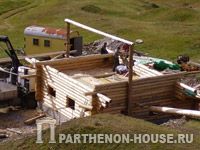 срубленный дом или дом из оцилиндрованного бревна